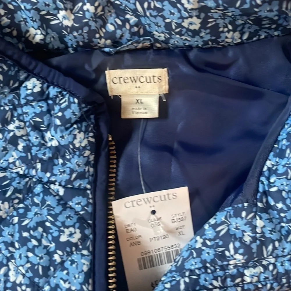 JCrew crewcut floral puffer vest.